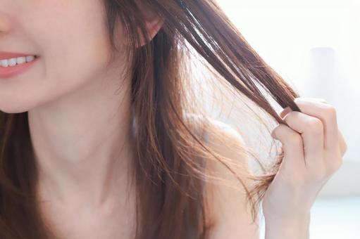 女性の髪の毛 ヘアケアイメージ 女性の髪の毛 ヘアケアイメージの写真