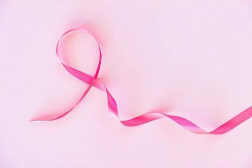 ピンク色のリボン（ピンク背景） ピンクリボン,乳がん,啓発の写真素材