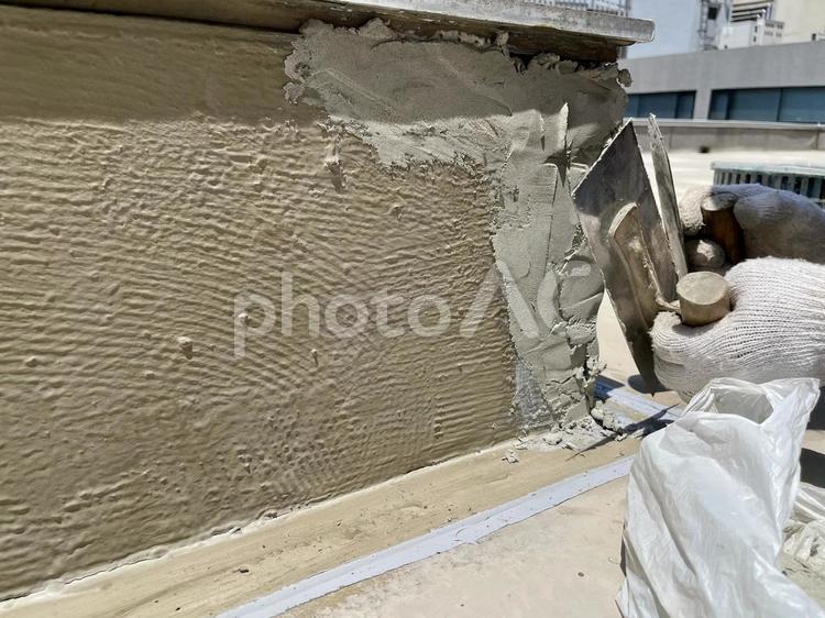 屋上立上りの左官工事風景① 防水,工事,モルタルの写真素材