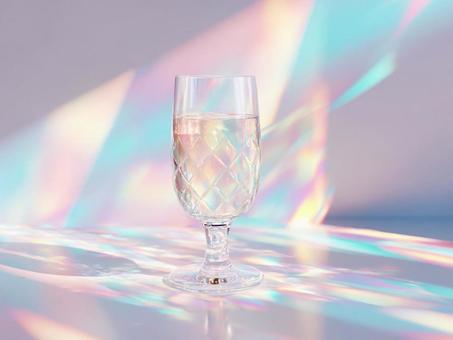 プリズムライトと飲み物が入ったグラス プリズムライトと飲み物が入ったグラスの写真