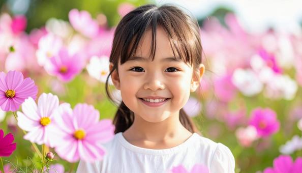 かわいい少女のポートレート コスモスの花 かわいい少女のポートレート コスモスの花の写真