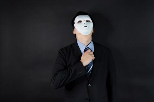 仮面をつけたスーツ男性 仮面,スーツ,男性の写真素材