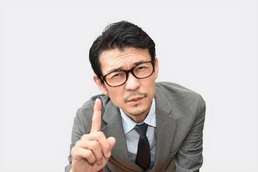 指を立てるビジネスマン(切り抜きパス) 指を立てるビジネスマン(切り抜きパス) 秘密,内緒,注意の写真素材