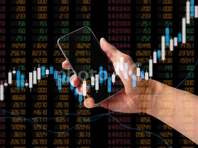 スマートホンで株式投資 スマホ,株,投資の写真素材
