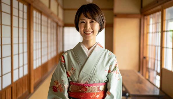 着物 女性 若女将 笑顔 20代 30代の写真