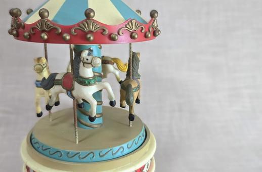 オルゴール オルゴール,メリーゴーランド,馬の写真素材