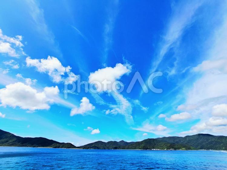 空の広がりと奄美の海 空,雲,気持ちいいの写真素材