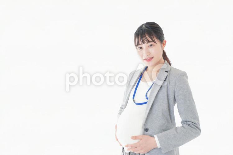 妊娠中の若いビジネスウーマン 手当て,退職,病院の写真素材