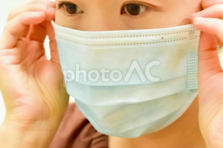 マスクを着用した女性アップ1 女性,マスク,コロナの写真素材