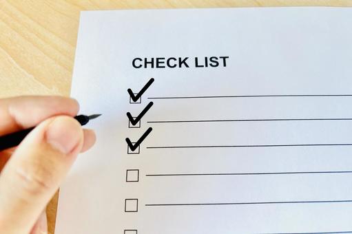 チェックリストにチェックを入れる人 チェックリスト,やること,予定の写真素材