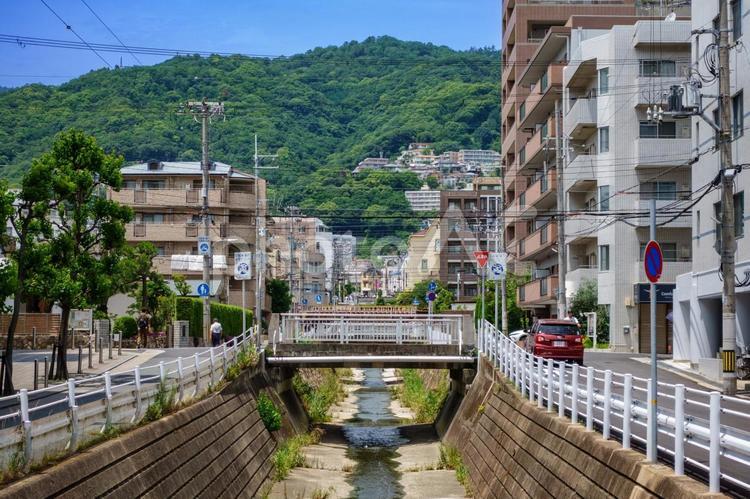 神戸市東灘区を流れる天上川と六甲山 天上川,神戸市,東灘区の写真素材
