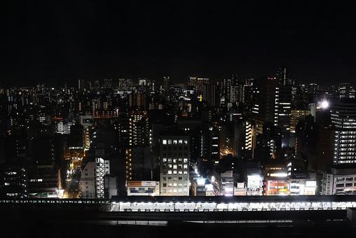 １０月中旬のJR両国駅と電車の夜景 街並み,都心,高層ビル群の写真素材