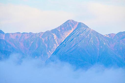 高ボッチ高原から望む早朝の常念岳 常念岳,北アルプス,連峰の写真素材