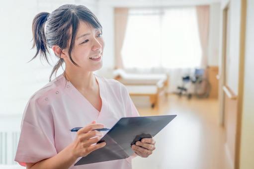 施設とスタッフ 介護,女性,介護士の写真素材