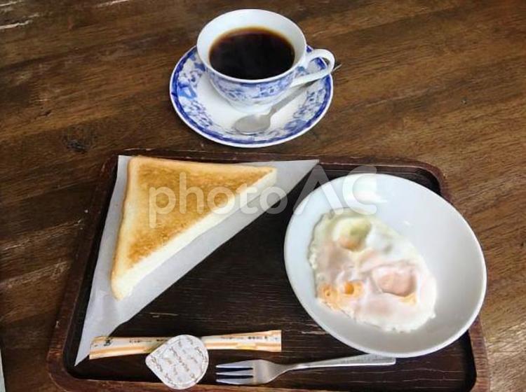 つぶれた目玉焼き コーヒー,パン,モーニングの写真素材