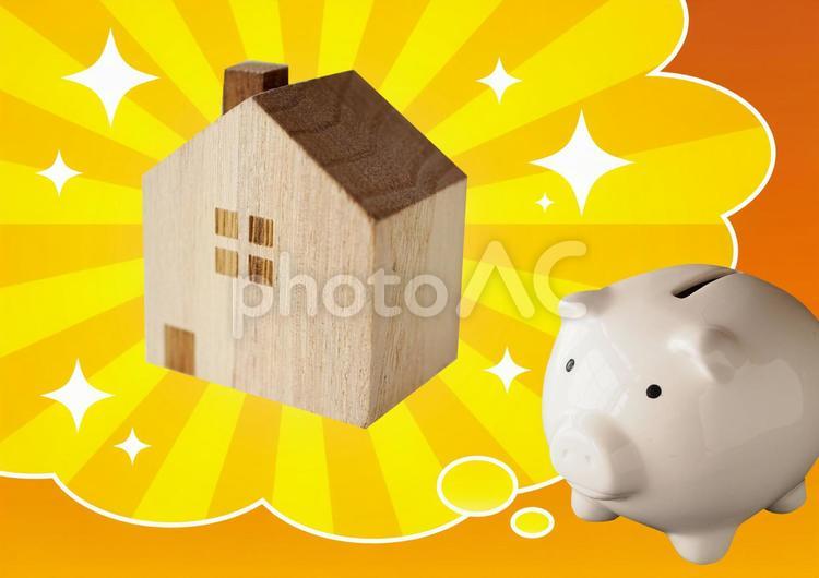 お金を貯めて夢のマイホーム 貯金,貯金箱,家の写真素材