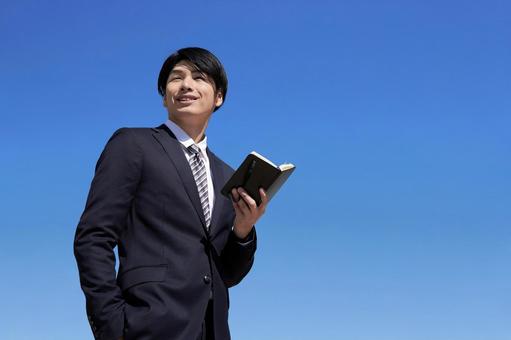 Japanese male businessman with a notebook, व्यवसायी, खाली, आदमी, JPG