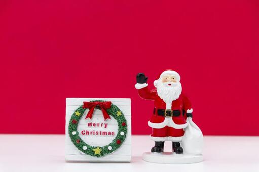 サンタクロースとメリークリスマスの看板 サンタクロース,クリスマス,メリークリスマスの写真素材