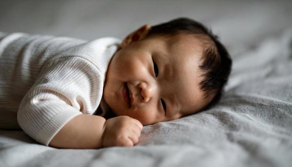 すやすや眠る日本人赤ちゃんの顔 すやすや眠る日本人赤ちゃんの顔の写真
