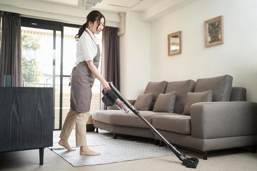 Asian woman vacuuming in the living room, clean up, vacuum cleaner, female, JPG