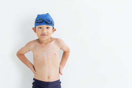 水着を着た笑顔の男の子 水着を着た笑顔の男の子 男の子,水着,白背景の写真素材