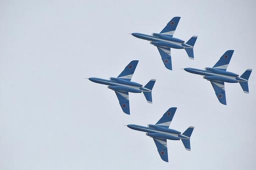 Blue Impulse flying through the cloudy sky, JPG Blue Impulse flying through the cloudy sky, JPG