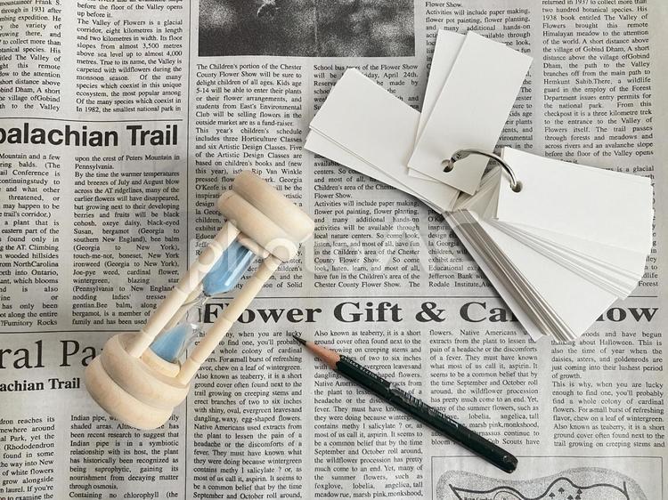 英字新聞と小物 英字新聞,英語新聞,砂時計の写真素材