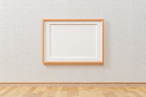 Wooden vertical A4 and A3 size picture frames. White wall. Flooring. Wooden vertical A4 and A3 size picture frames. White wall. Flooring.