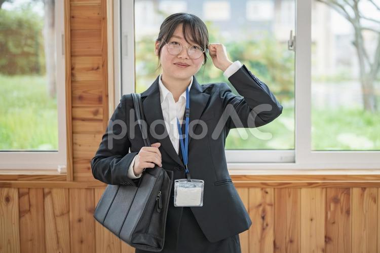 眼鏡をかけた女性 眼鏡をかけた女性 女性,笑顔,ビジネスの写真素材