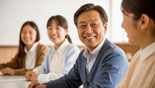 保護者会 放課後の小学校で会議をする人々 保護者会 放課後の小学校で会議をする人々の写真