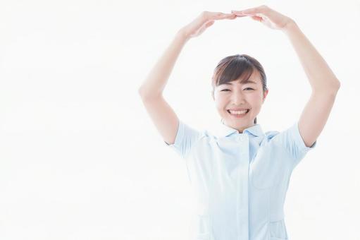 OKを示す若い看護師 OKを示す若い看護師 承知,看護婦,グーの写真素材