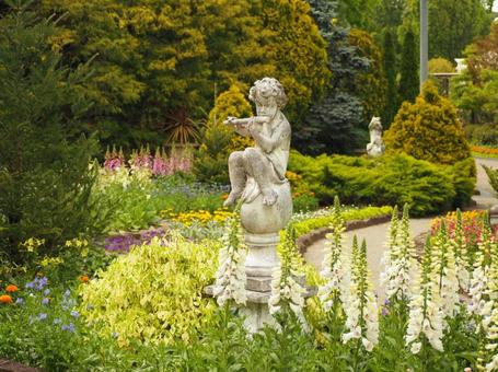 Spring garden with angel statue, JPG Spring garden with angel statue, JPG