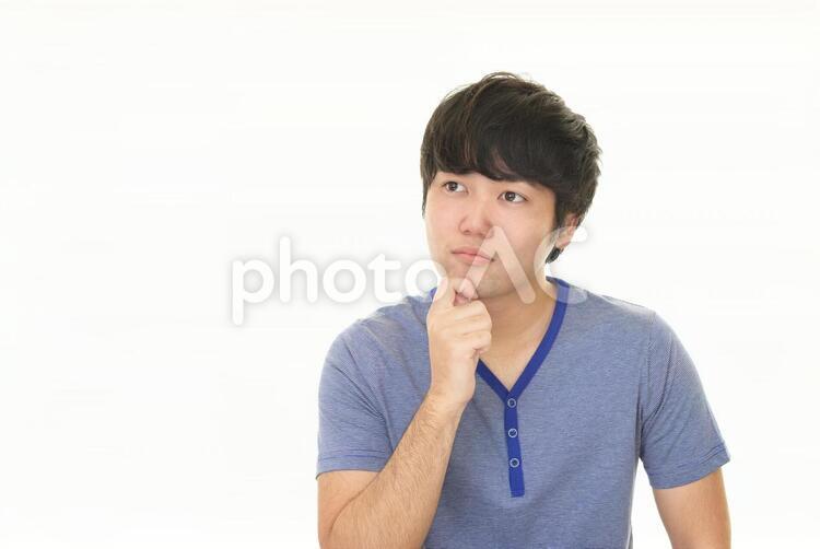 不安そうな表情の男性 男性,男,ストレスの写真素材