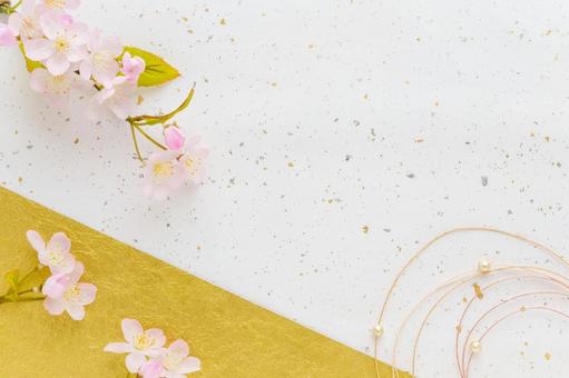 桜と金箔の入った和紙と水引の背景素材 桜,和紙,白の写真素材