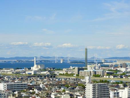 丸亀城から望む瀬戸大橋とゴールドタワー 瀬戸大橋,瀬戸内海,丸亀市の写真素材