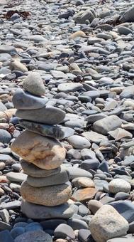 浜辺で石を積んでみた ヨーロッパ,旅,レトロの写真素材