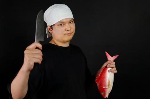 魚をさばく料理人 魚をさばく料理人 料理人,魚,包丁の写真素材