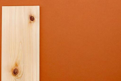 オレンジ背景とヒノキの板 木材,木目,板の写真素材