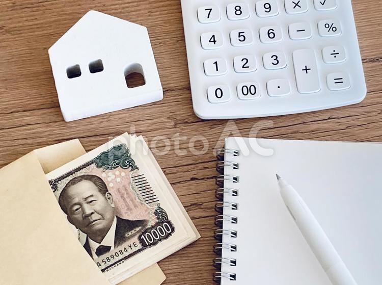 家、金、電卓とノート 住宅,不動産,家の写真素材