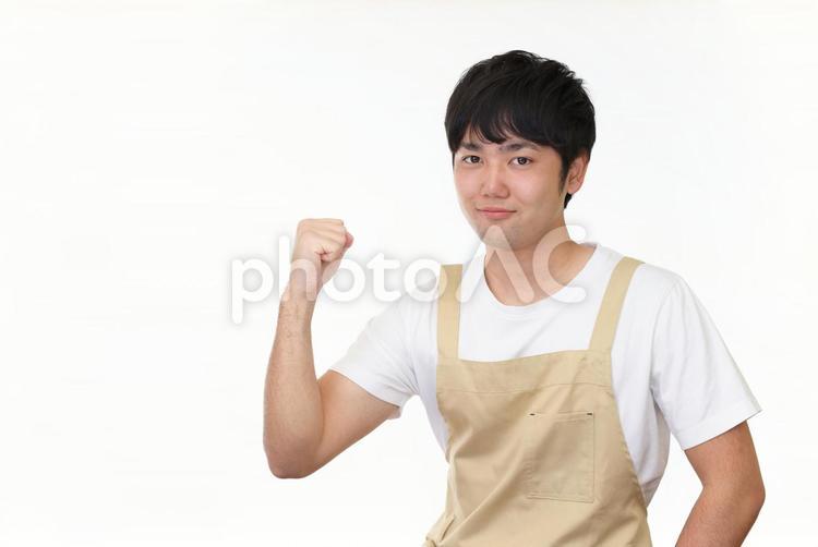 エプロン姿の男性 男性,エプロン,主夫の写真素材