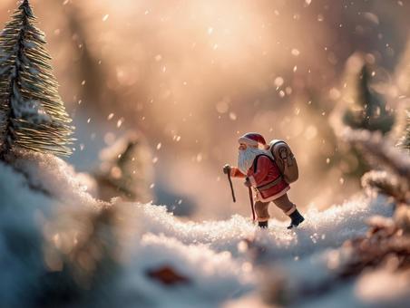 雪道を歩くサンタ人形の写真