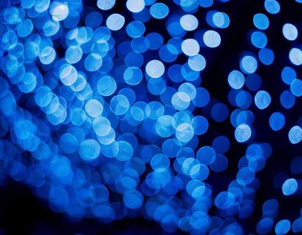 青い玉ボケの写真