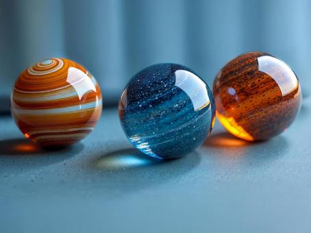 惑星のデザインのビー玉の写真