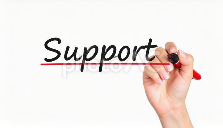文字「Support」と赤ペンで書く手元 サポート,助ける,援助の写真素材