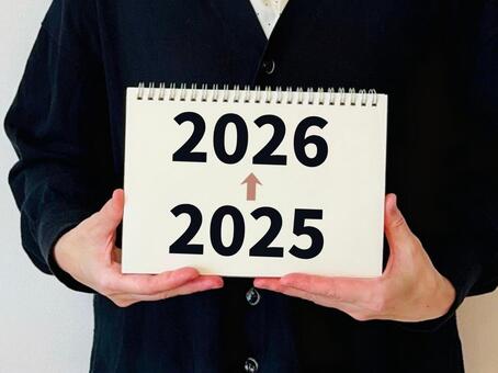 2025 → 2026（ノートを持つ女） 2025,2026,年末年始の写真素材