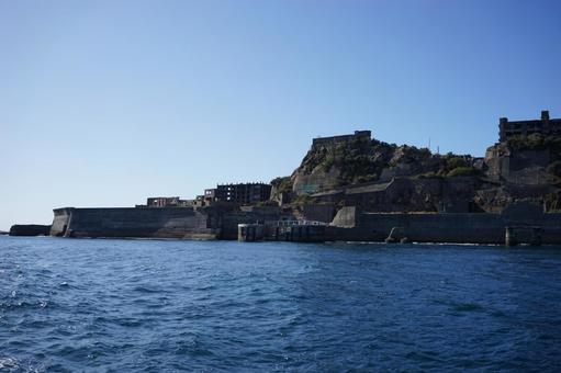 軍艦島の岸壁と遺構 軍艦島,長崎,廃墟の写真素材