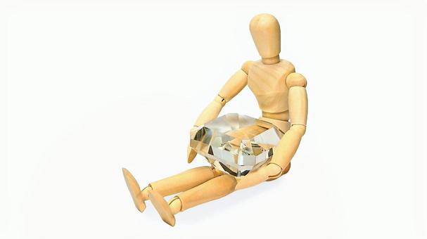 ダイヤを抱えるデッサン人形 ダイヤを抱えるデッサン人形 ダイヤ,デッサン人形,宝物の写真素材