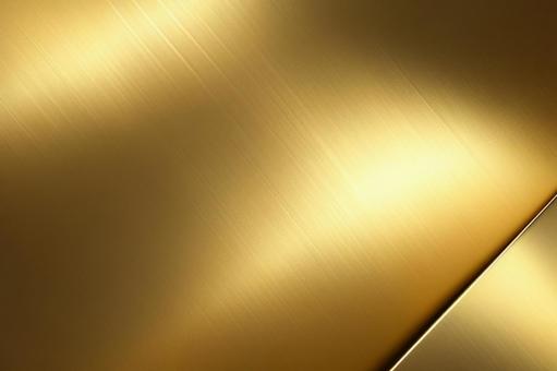 高級感ある金の金属テクスチャの写真