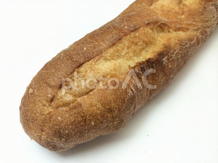 こんがり焼いたパリジャンの先っちょ パリジャン,フランスパン,先端の写真素材