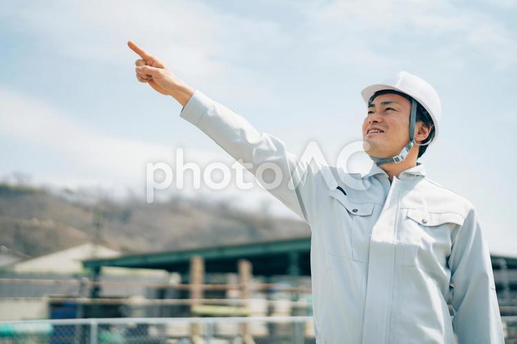 足場工事・建築業・作業着を着た男性 足場職人,解体業,鳶職人の写真素材